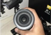 كاميرة نيكون Z5 مع عدسه24-70 F4 بطارية مع صندوق وشنطة