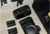 كاميرة نيكون Z5 مع عدسه24-70 F4 بطارية مع صندوق وشنطة