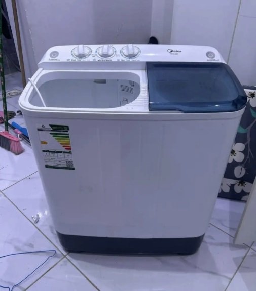 ‏غسالة ملابس