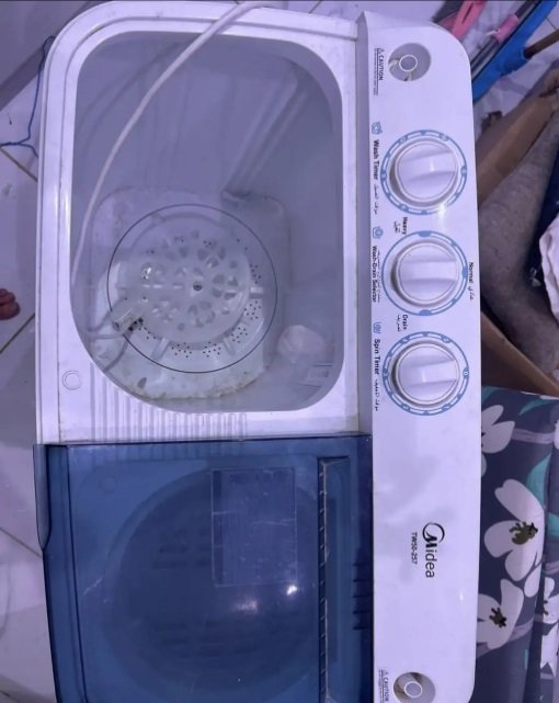 ‏غسالة ملابس