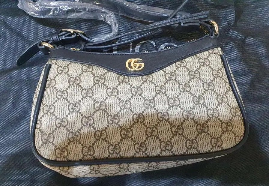 شنطة قوتشي نسائية