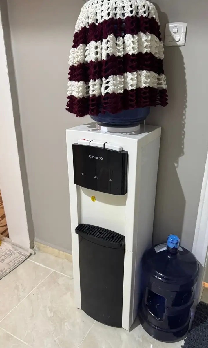 برادة بحاله ممتازه ومعاها جالون مويه جديد