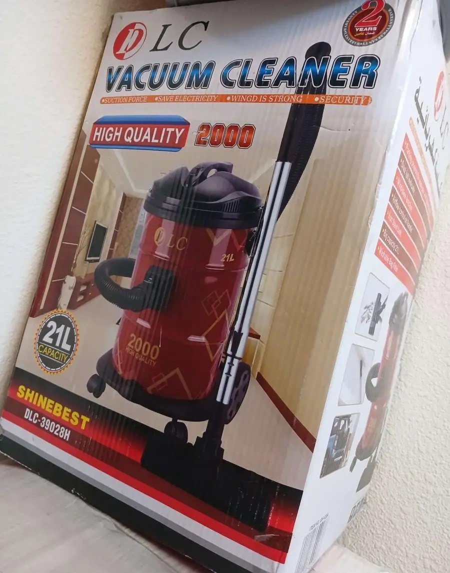 مكنسة كهربائية جديدة بكرتونها